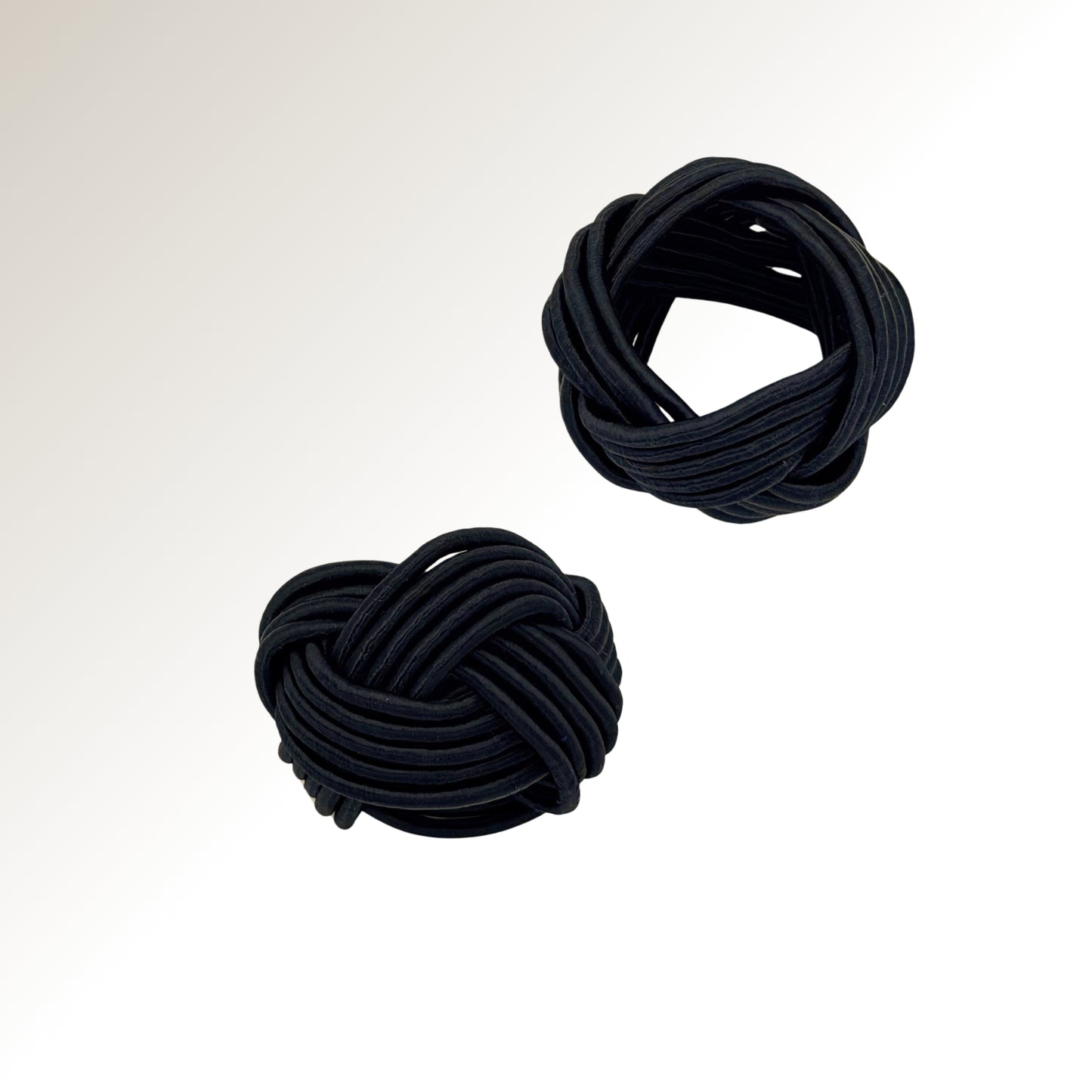Noir ring.