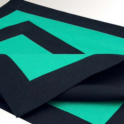 Black and emerald signature placemat.