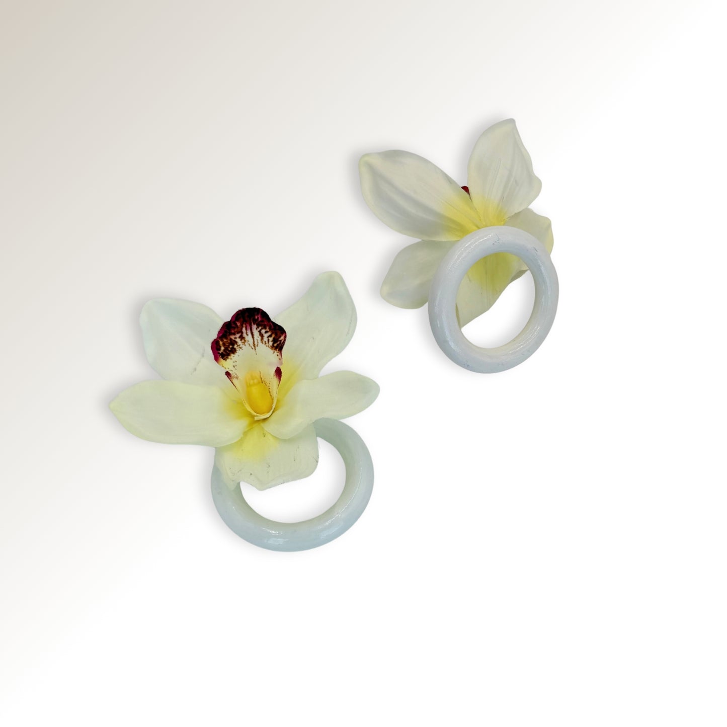 White orchid ring.