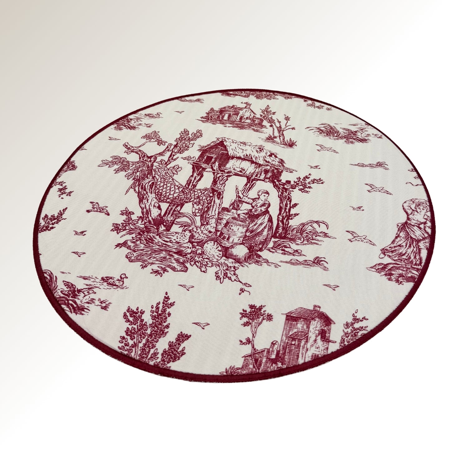 Burgundy toile placemats.
