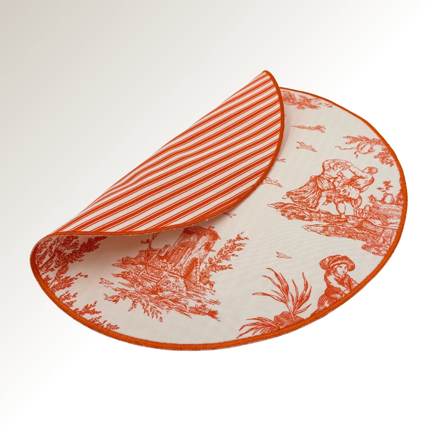 Orange toile placemats.